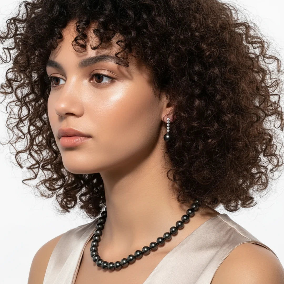 Brinco Zyelle Ouro Branco 10K com Pérola Negra do Taiti